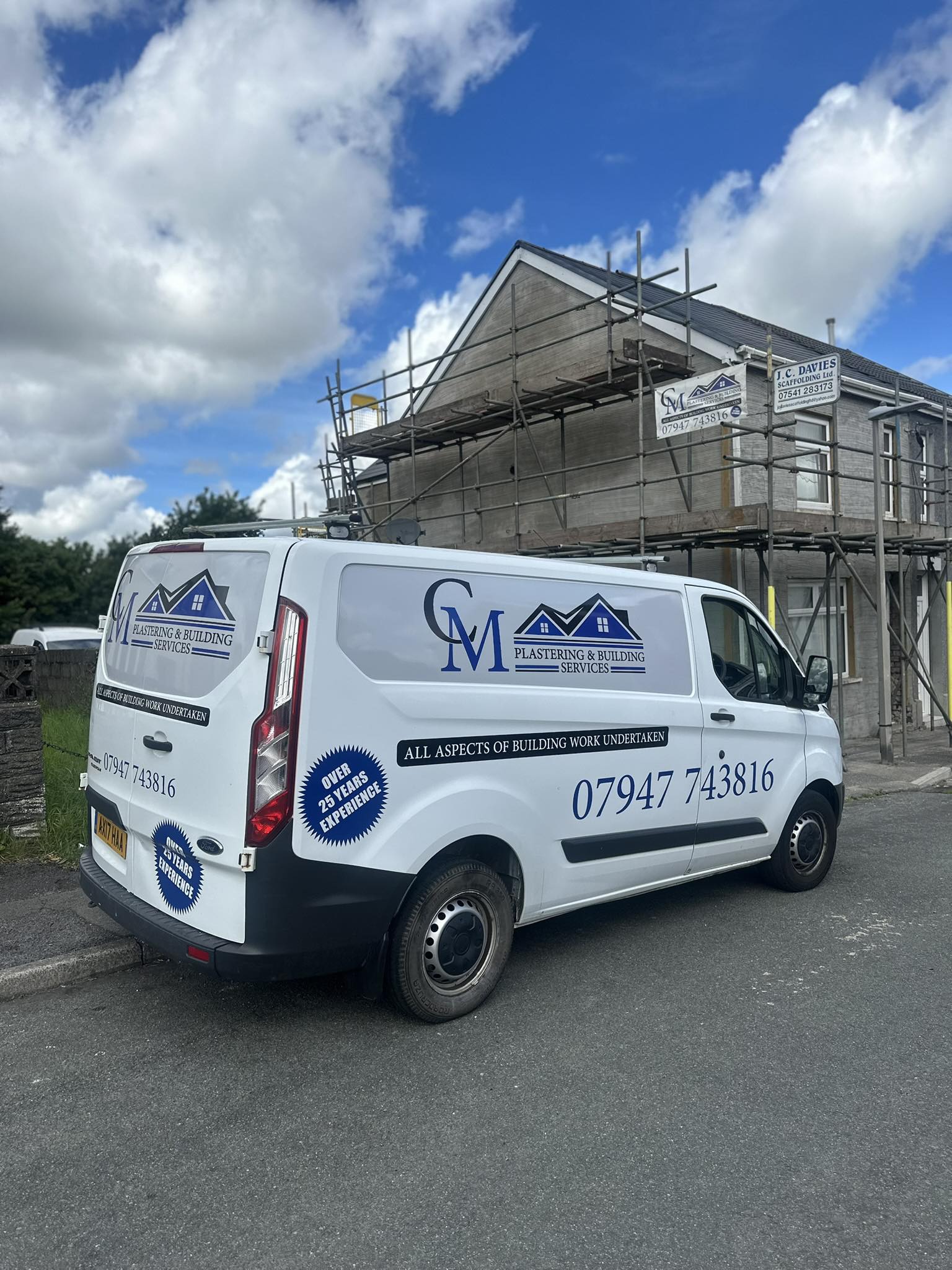 Professional plastering and wall rendering work in modern building renovation